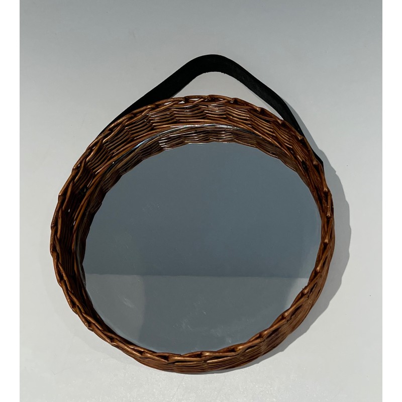 Vintage round mirror in leather and rattan, 1950