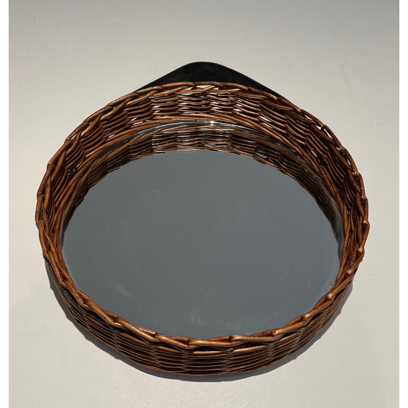 Vintage round mirror in leather and rattan, 1950