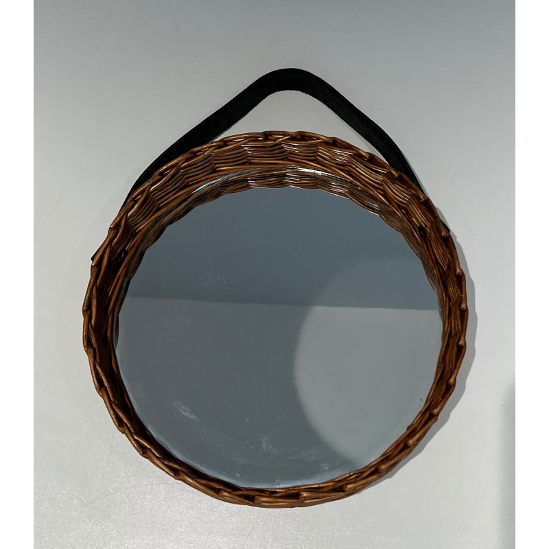 Vintage round mirror in leather and rattan, 1950