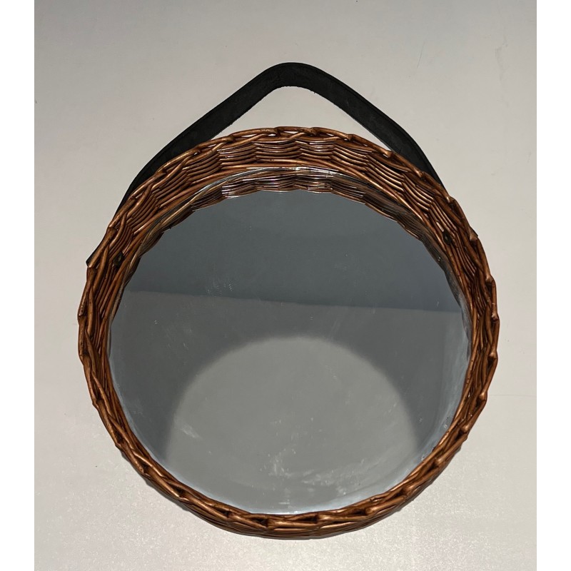 Vintage round mirror in leather and rattan, 1950