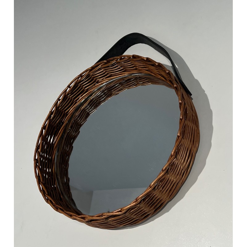 Vintage round mirror in leather and rattan, 1950