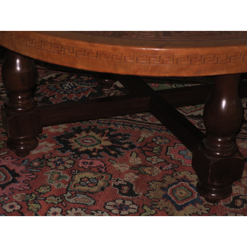 Vintage circular coffee table with a tooled leather top by Angel Pazmino for Muebles de Estilo, 1970s