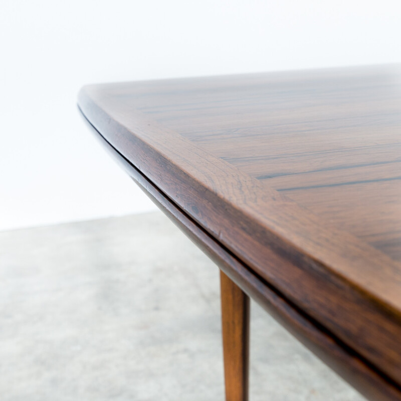 Rosewood dining table extendable with triangle shaped legs - 1960s