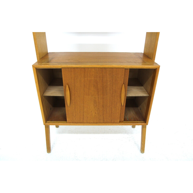 Libreria vintage in teak con piedistallo sospeso, Svezia 1960