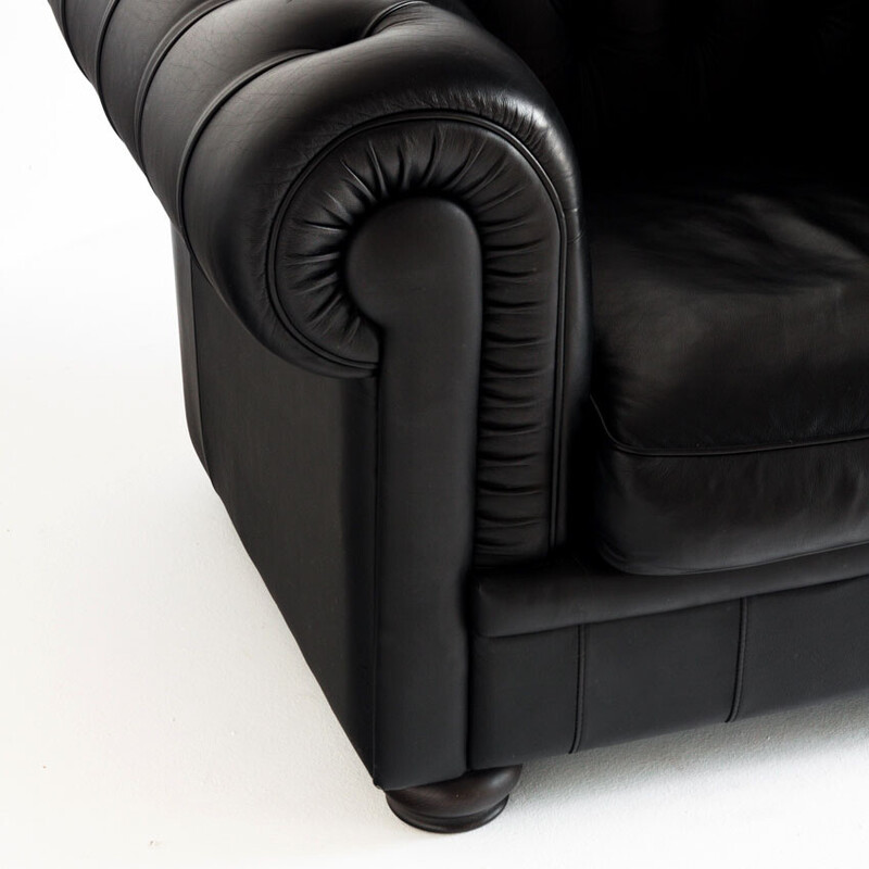 Vintage Chesterfield "King" armchair in black leather by Natuzzi, Italy