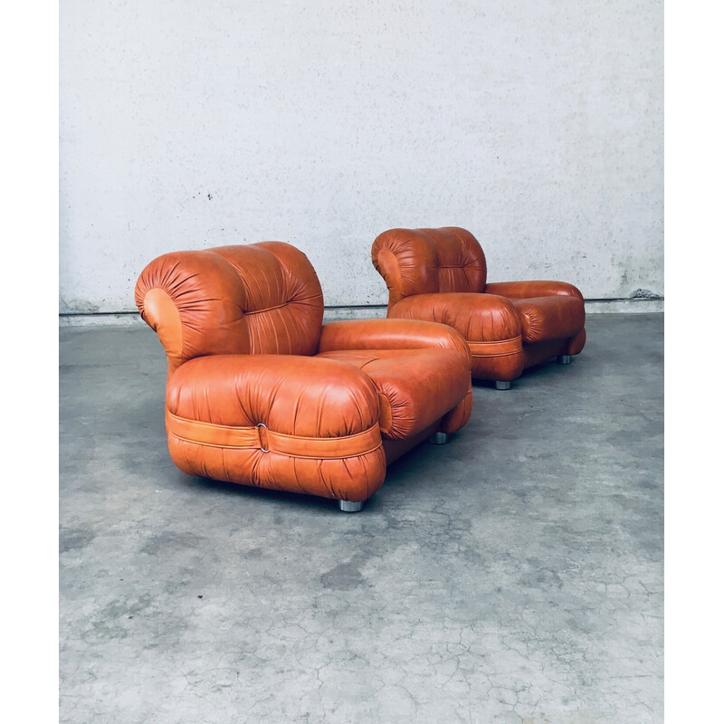 Pair of mid century Italian leather armchairs, 1970s