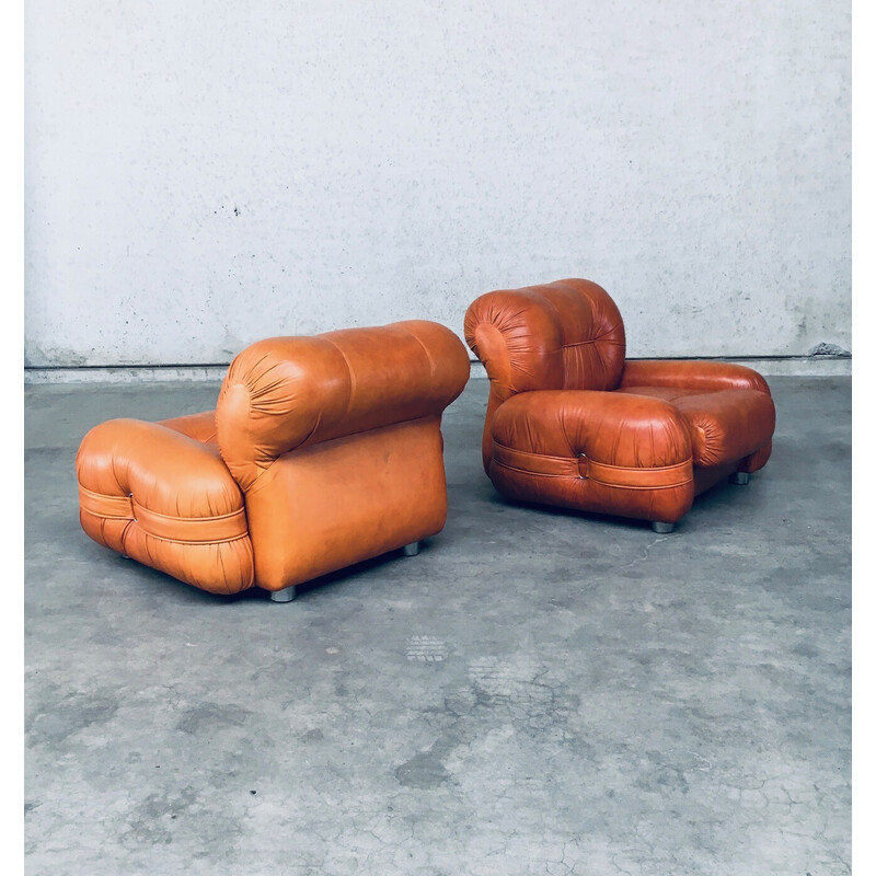 Pair of mid century Italian leather armchairs, 1970s