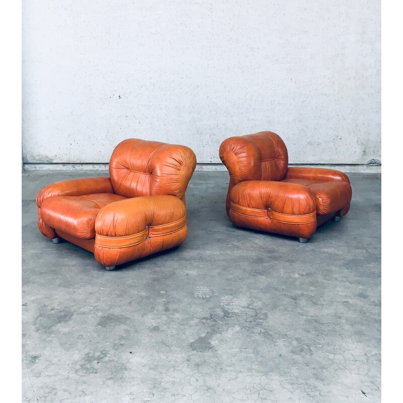 Pair of mid century Italian leather armchairs, 1970s