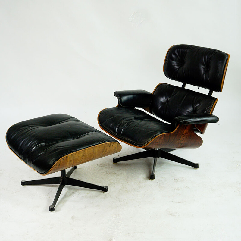 Vintage rosewood armchair with footrest mod by Ray and Charles Eames for Herman Miller, 1956