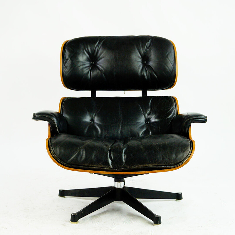 Poltrona vintage in palissandro con poggiapiedi mod. da Ray e Charles Eames per Herman Miller, 1956