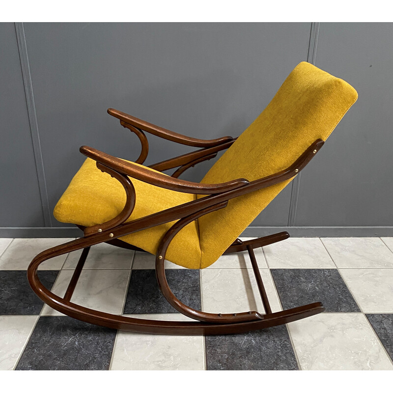 Vintage schommelstoel in geel van Ton