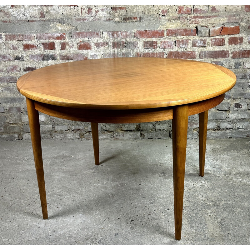 Skandinavischer Vintage-Tisch aus Teakholz mit integrierten Verlängerungen, 1960
