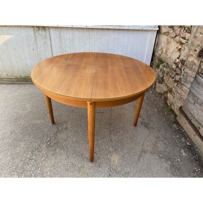 Scandinavian vintage round extensible table in teak