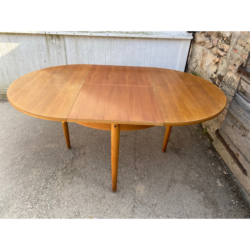 Scandinavian vintage round extensible table in teak