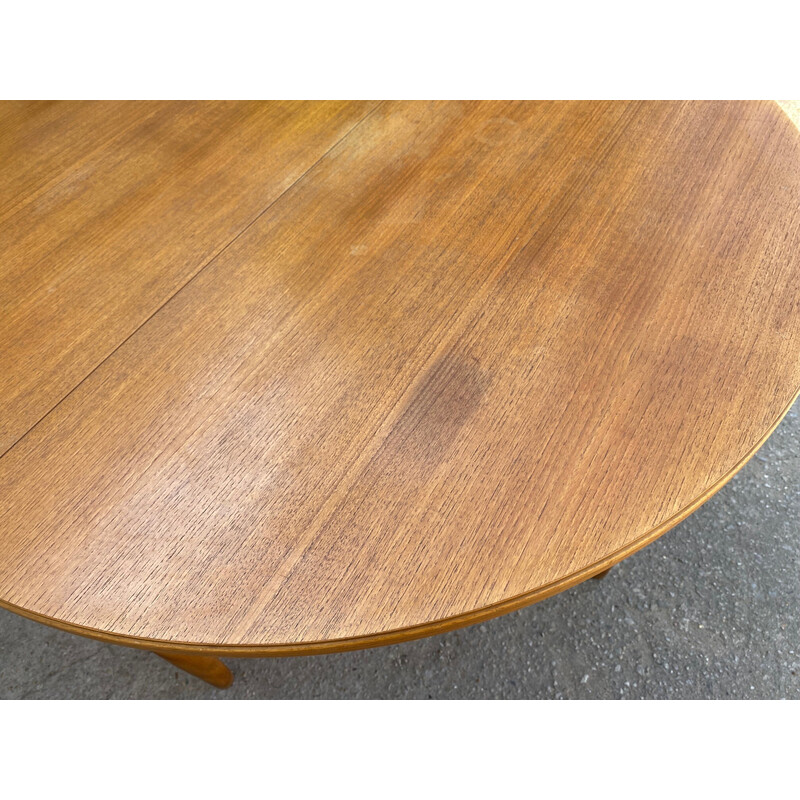Scandinavian vintage round extensible table in teak