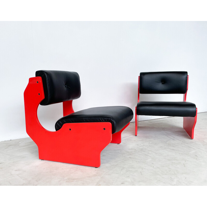 Pair of vintage armchairs in red lacquered wood and black leather, Italy 1980