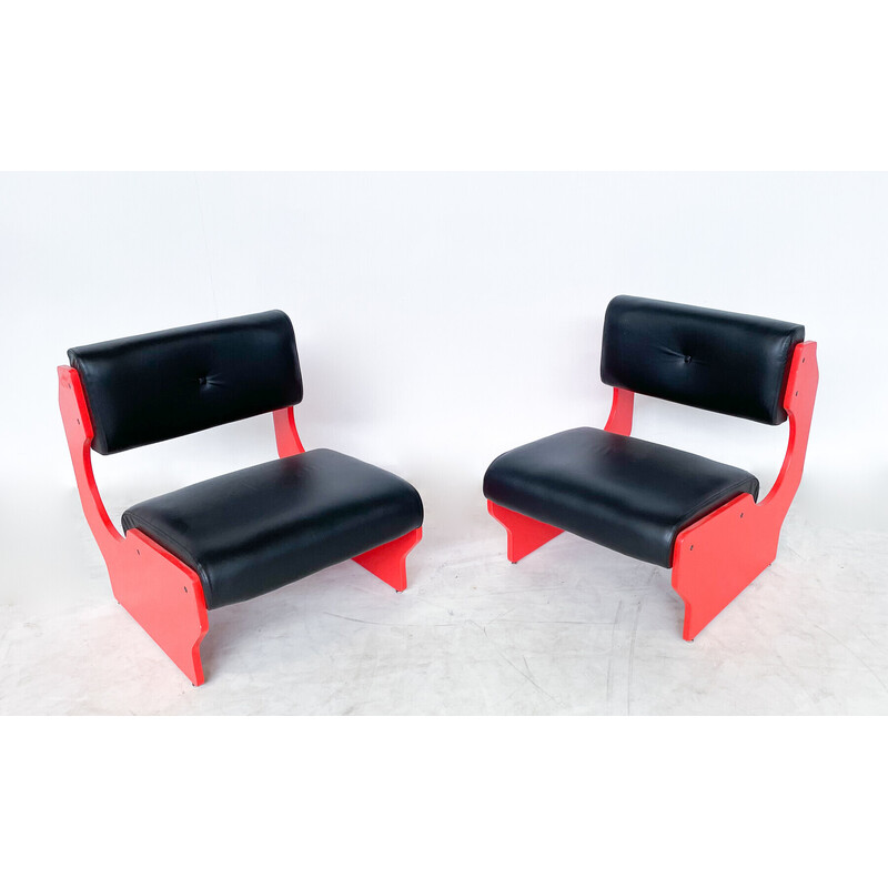 Pair of vintage armchairs in red lacquered wood and black leather, Italy 1980