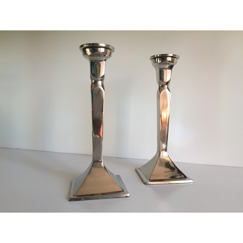 Pareja de candelabros vintage de aluminio fundido