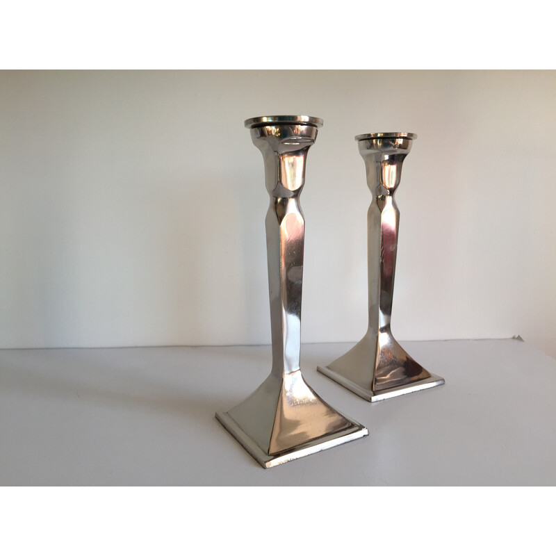 Pareja de candelabros vintage de aluminio fundido