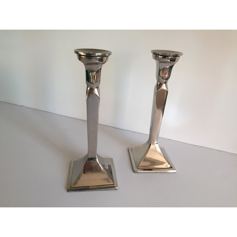 Pareja de candelabros vintage de aluminio fundido