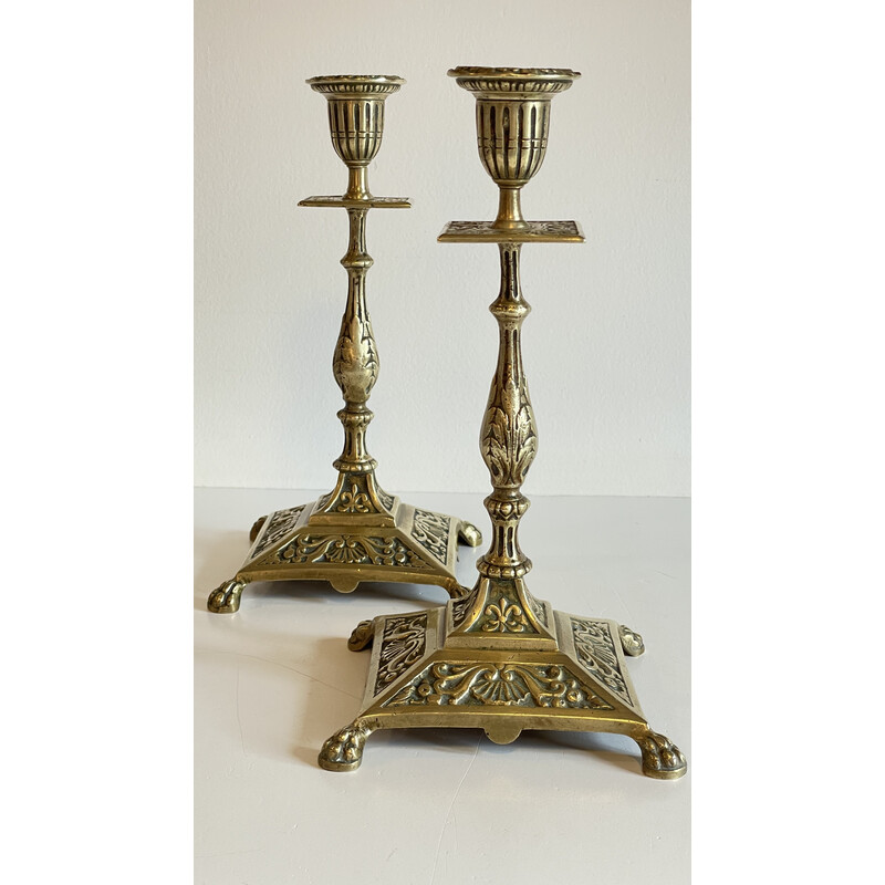 Coppia di candelieri d'epoca in ottone a forma di zampa di leone