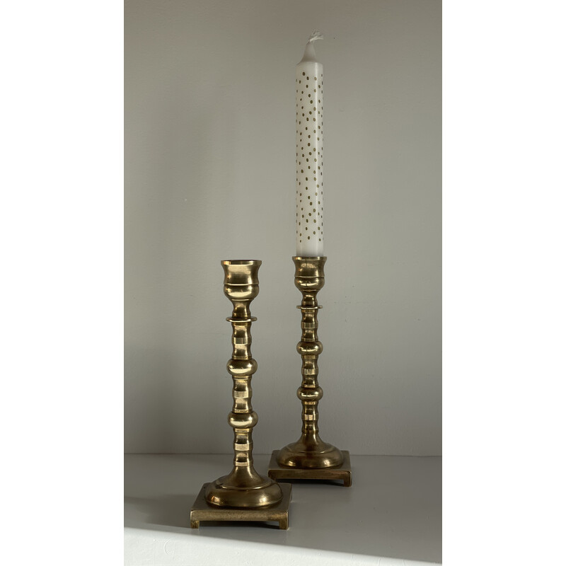 Pair of vintage brass lion paw candlesticks