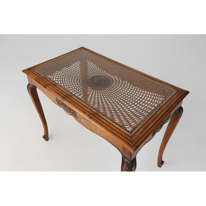 Vintage side table with sculpted elements and rattan top