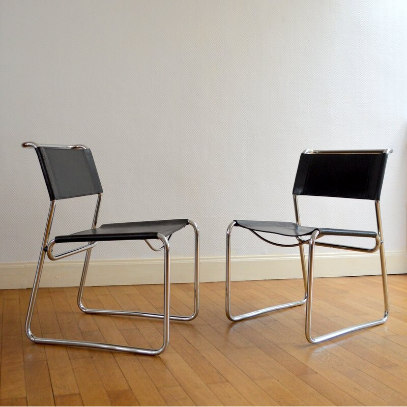 Pair of vintage chairs in chromed metal and leather - 1970s