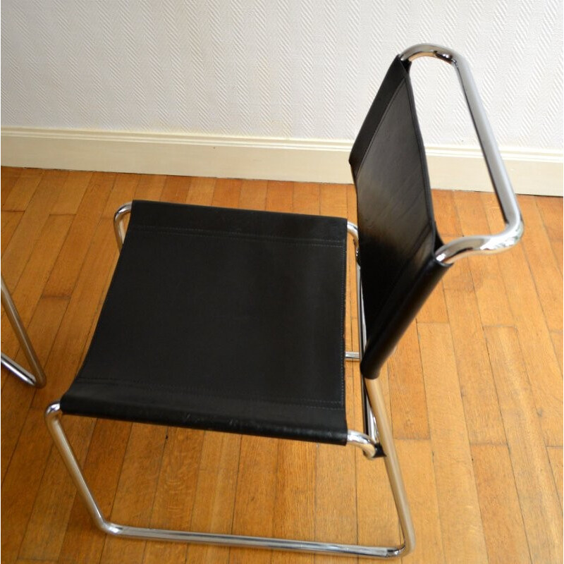 Pair of vintage chairs in chromed metal and leather - 1970s