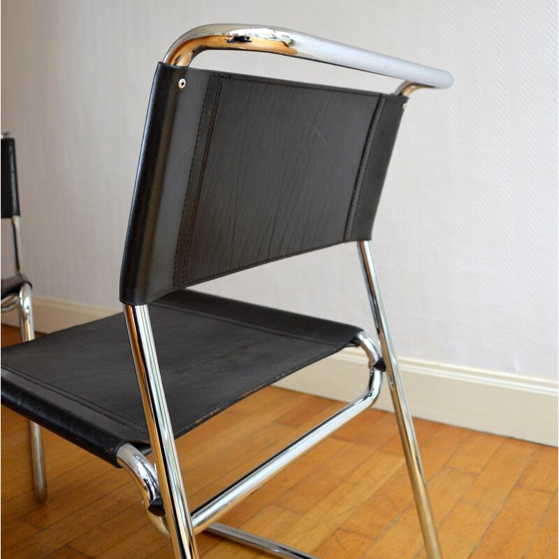 Pair of vintage chairs in chromed metal and leather - 1970s