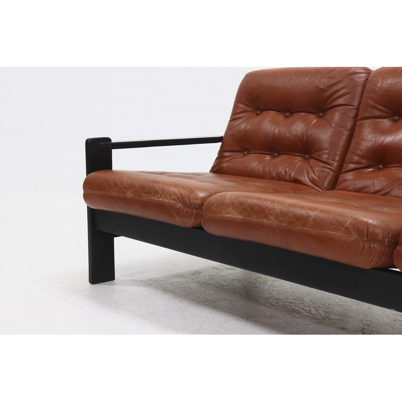 Vintage brutalist 3-seater sofa in leather and ebonized wood, 1970s