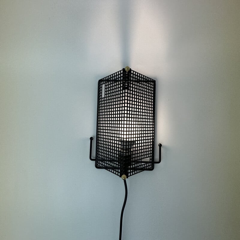 Mid century perforated metal wall lamp by Tjerk Reijenga for Pilastro, 1950s