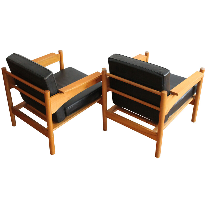 Lot de deux fauteuils en cuir noir -  1970