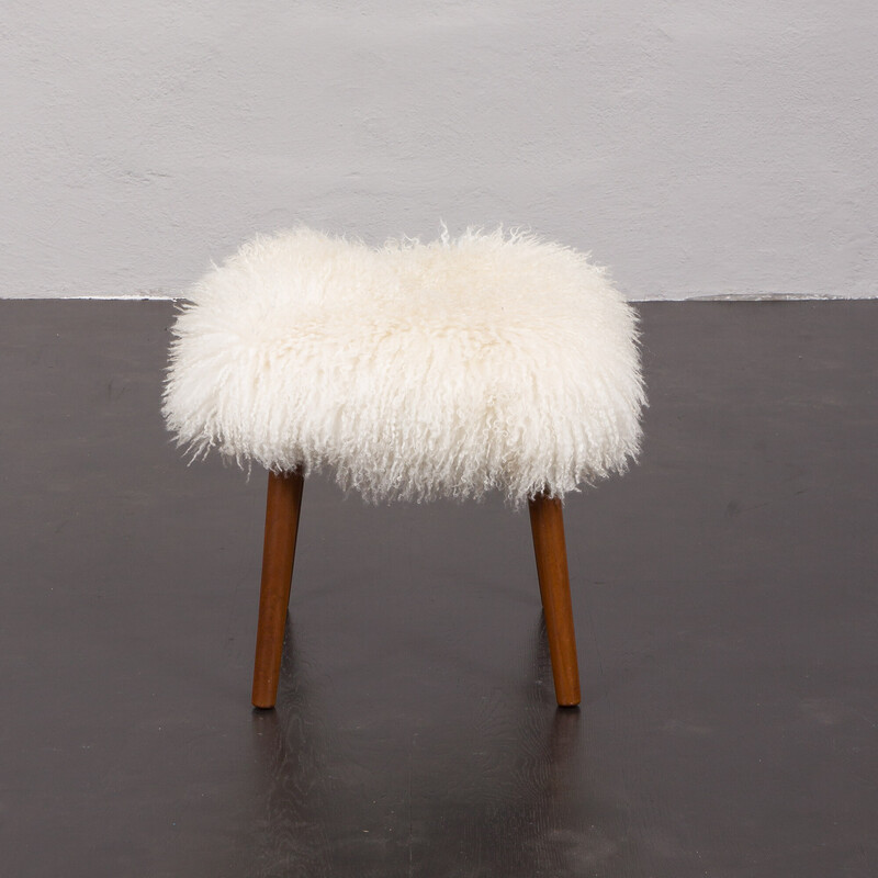 Danish mid century footrest in natural long hair sheepskin and teak legs, 1960s