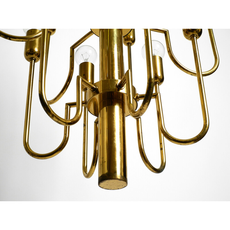 Mid century brass chandelier with a long brass rod