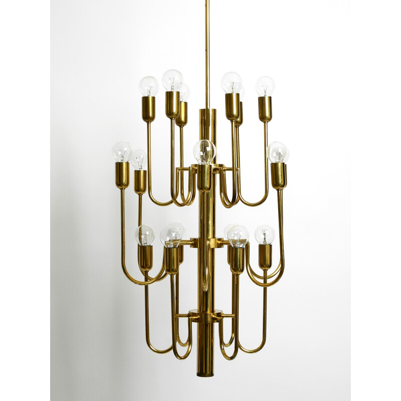 Mid century brass chandelier with a long brass rod