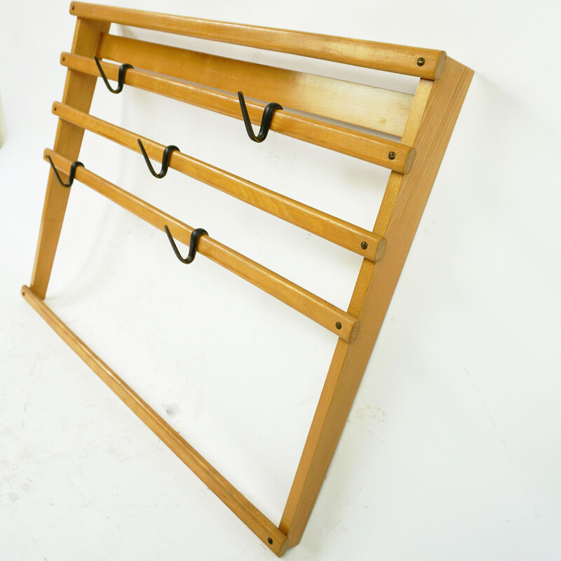 Austrian mid century beechwood and blackened brass wall coat rack by Carl Auböck