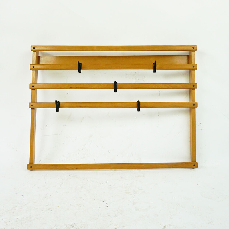 Austrian mid century beechwood and blackened brass wall coat rack by Carl Auböck