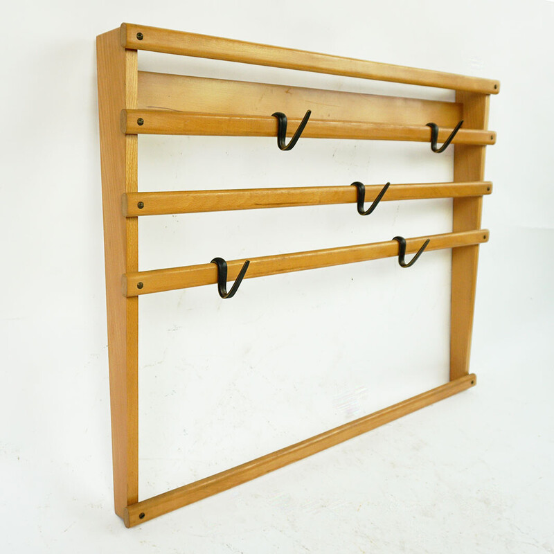 Austrian mid century beechwood and blackened brass wall coat rack by Carl Auböck