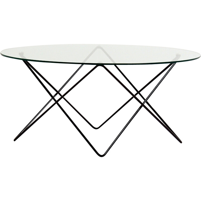 Table basse vintage avec structure métallique et plateau en verre transparent