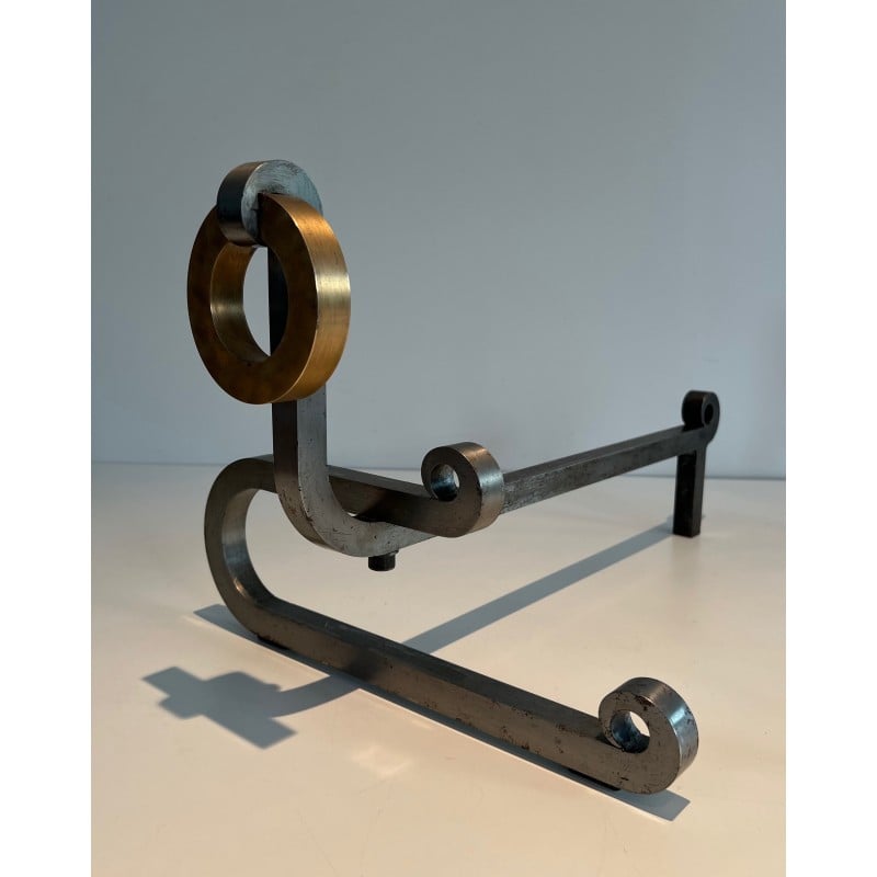 Pair of vintage modernist andirons in chromed steel, brass and wrought iron, 1970