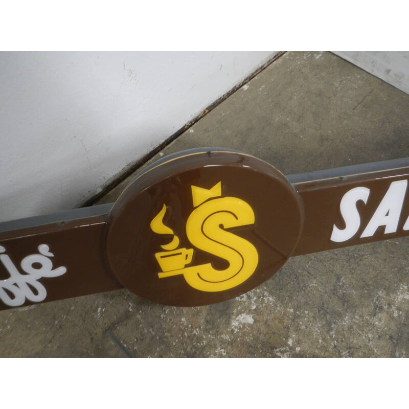 Inscription vintage en plastique pour le bar Caffe Salvagnin