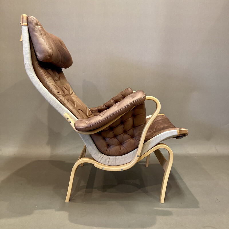 Vintage "Pernilla" armchair in leather and beechwood by "Bruno Mathsson" for "Dux", 1960