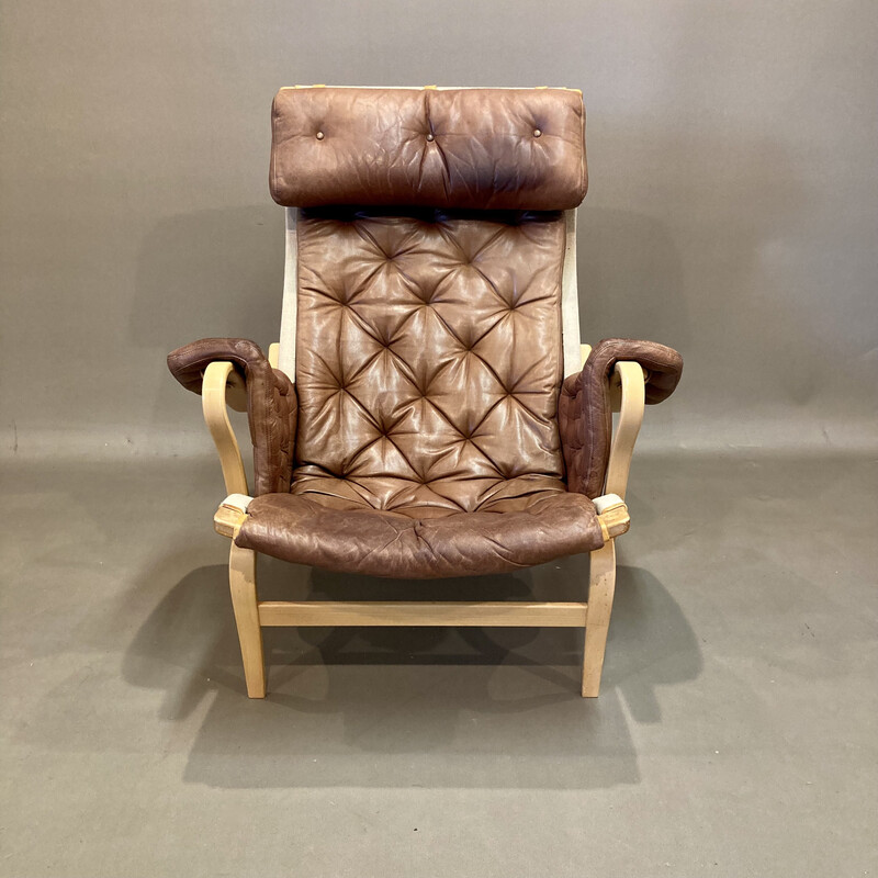 Vintage "Pernilla" armchair in leather and beechwood by "Bruno Mathsson" for "Dux", 1960