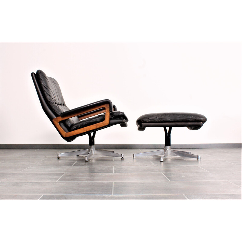 Fauteuil King vintage en cuir noir avec hocker par André Vandenbeuck pour Strässle