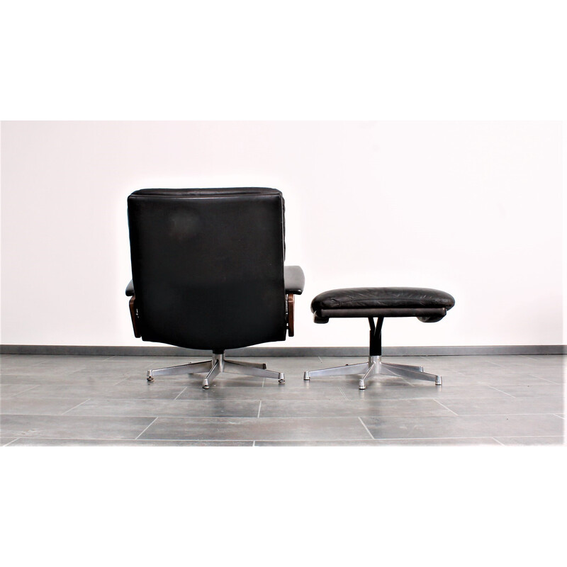 Vintage King armchair in black leather with hocker by André Vandenbeuck for Strässle