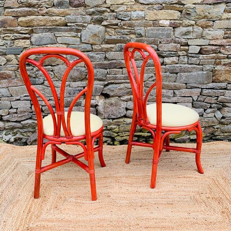 Pair of vintage chairs in red rattan and fabric