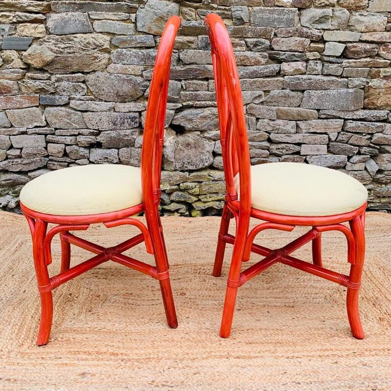 Pair of vintage chairs in red rattan and fabric