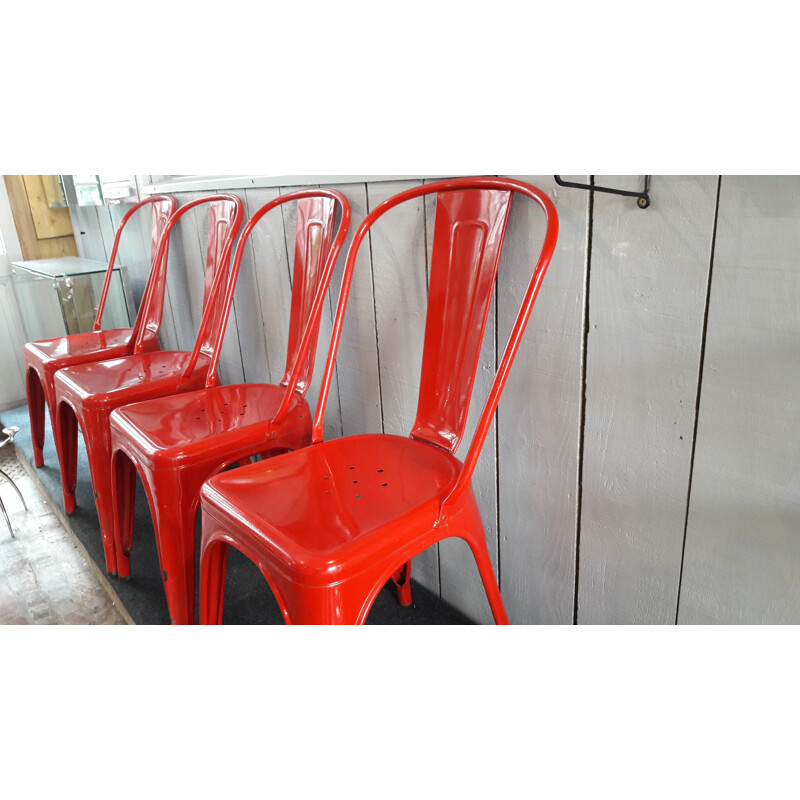Suite of 4 chairs red TOLIX by X.PAUCHARD - 1950s