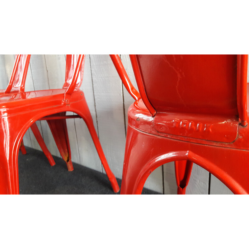 Suite of 4 chairs red TOLIX by X.PAUCHARD - 1950s